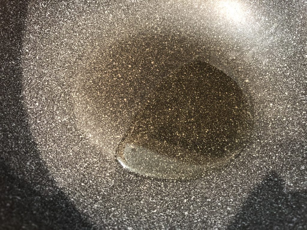 Heat oil in pan