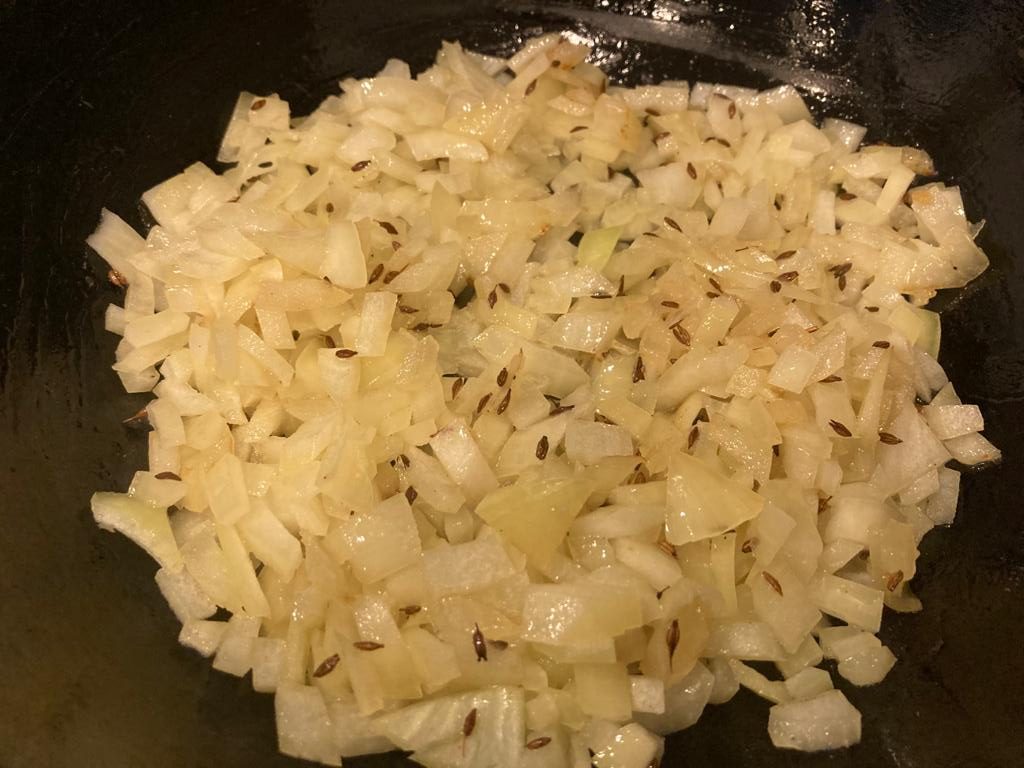 Onion into pan